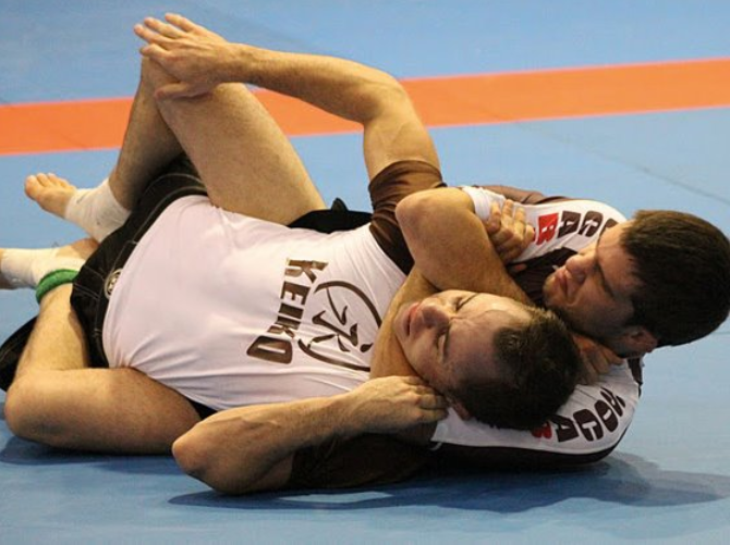 Defending Against the Rear Naked Choke and the Front Headlock – Effective  Self Defense